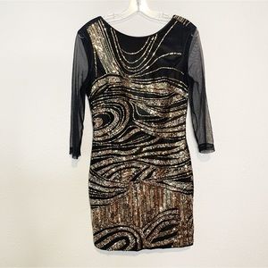Bebe Sheer long sleeve bodycon sequin mini dress